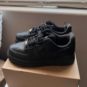 Nike Air Force 1s black and gold women’s size 8